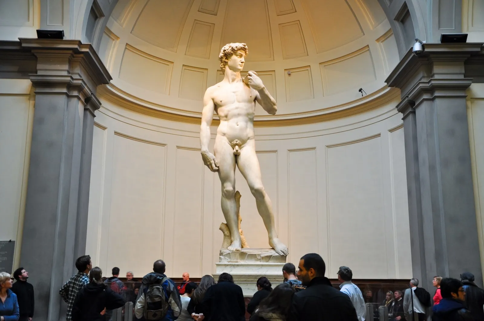 Statue of Michelangelo's David in the Hall of the Colossus at the Uffizi Gallery, Florence.